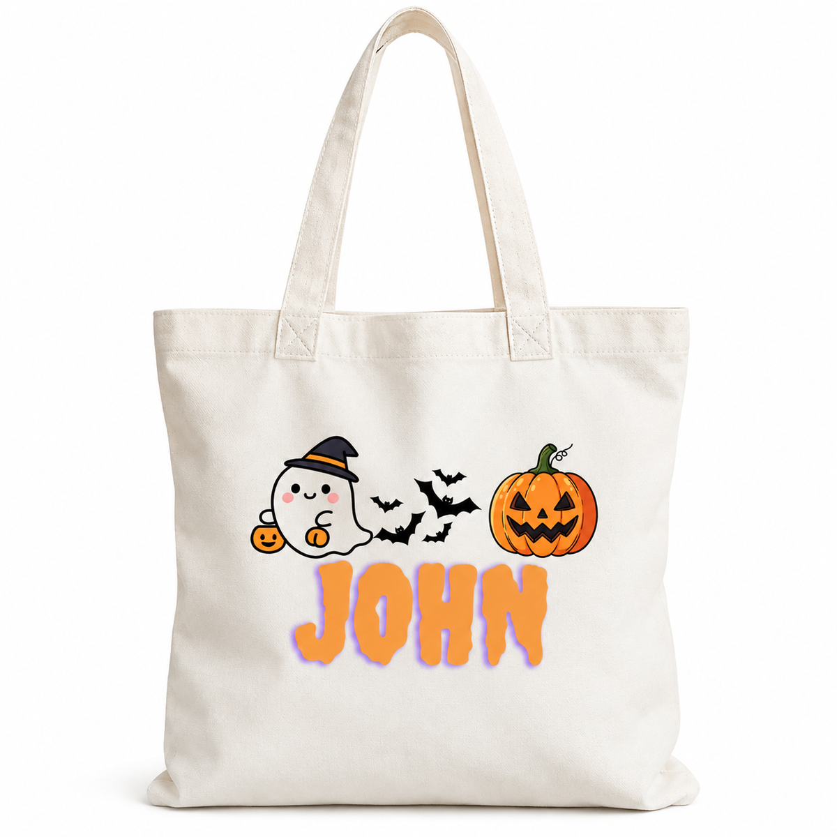 An off-white canvas tote bag with a Halloween graphic featuring a ghost, a pumpkin, bats, and the name 'JOHN' in orange, shown on a plain white background.